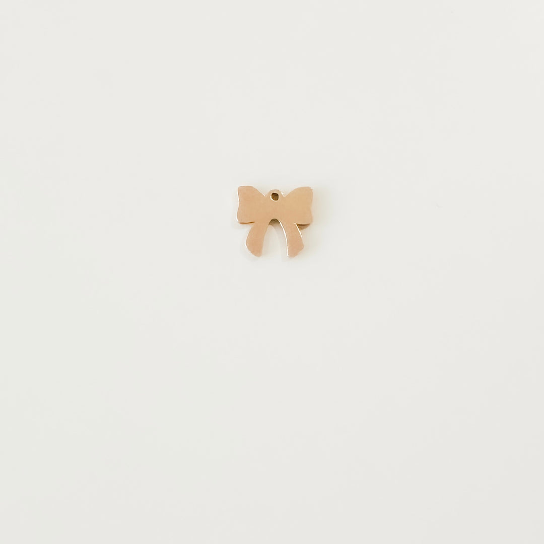 gold filled charms, permanent jewelry supplies, gold filled bow charm, bow charm, sterling silver bow charm, permanent jewelry charm, permanent jewelry connector, permanent jewelry supplier, essbe jewelry supply, essbe