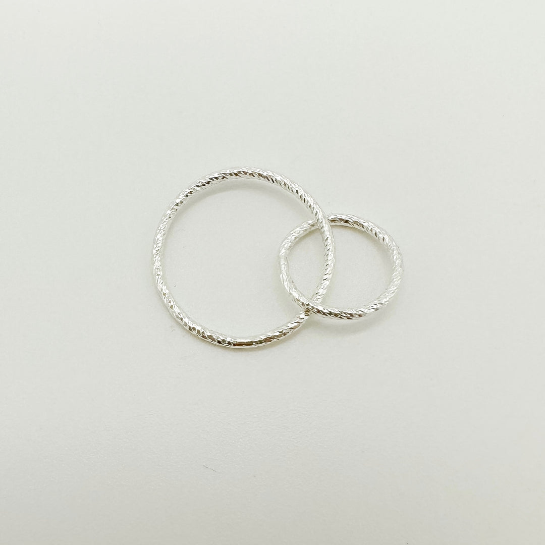 Intertwined circle connectors for permanent jewelry or jewelry making
