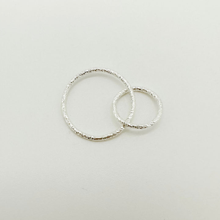 Intertwined circle connectors for permanent jewelry or jewelry making