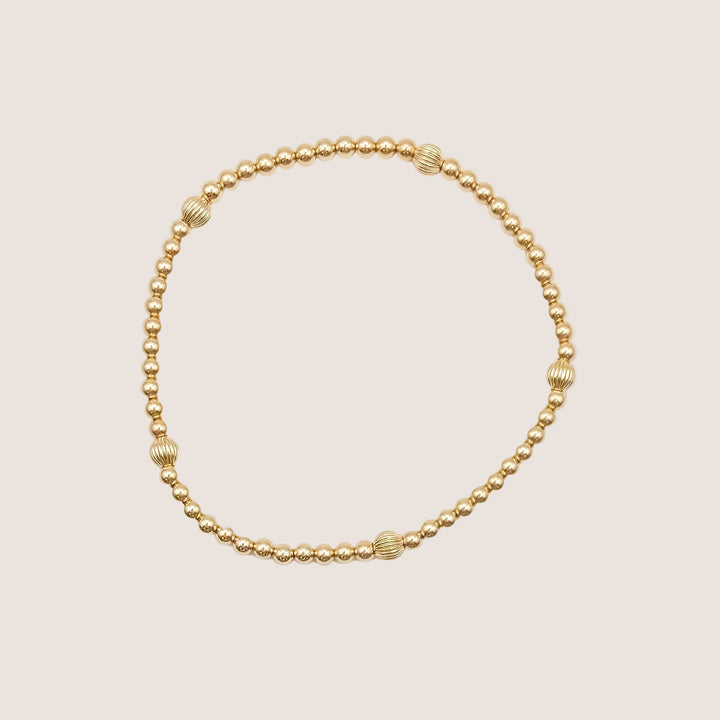 gold-filled beaded bracelet, textured gold beaded bracelet, stretchy beaded bracelet